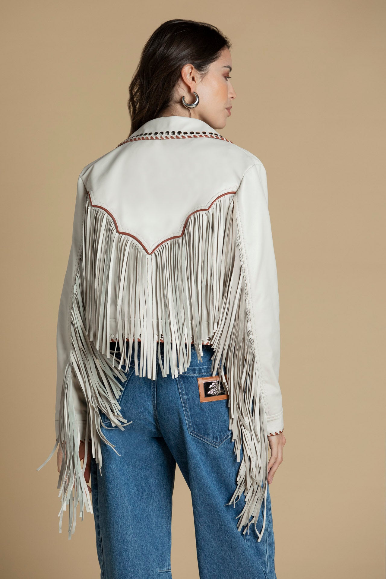 Casaco de pele com franjas