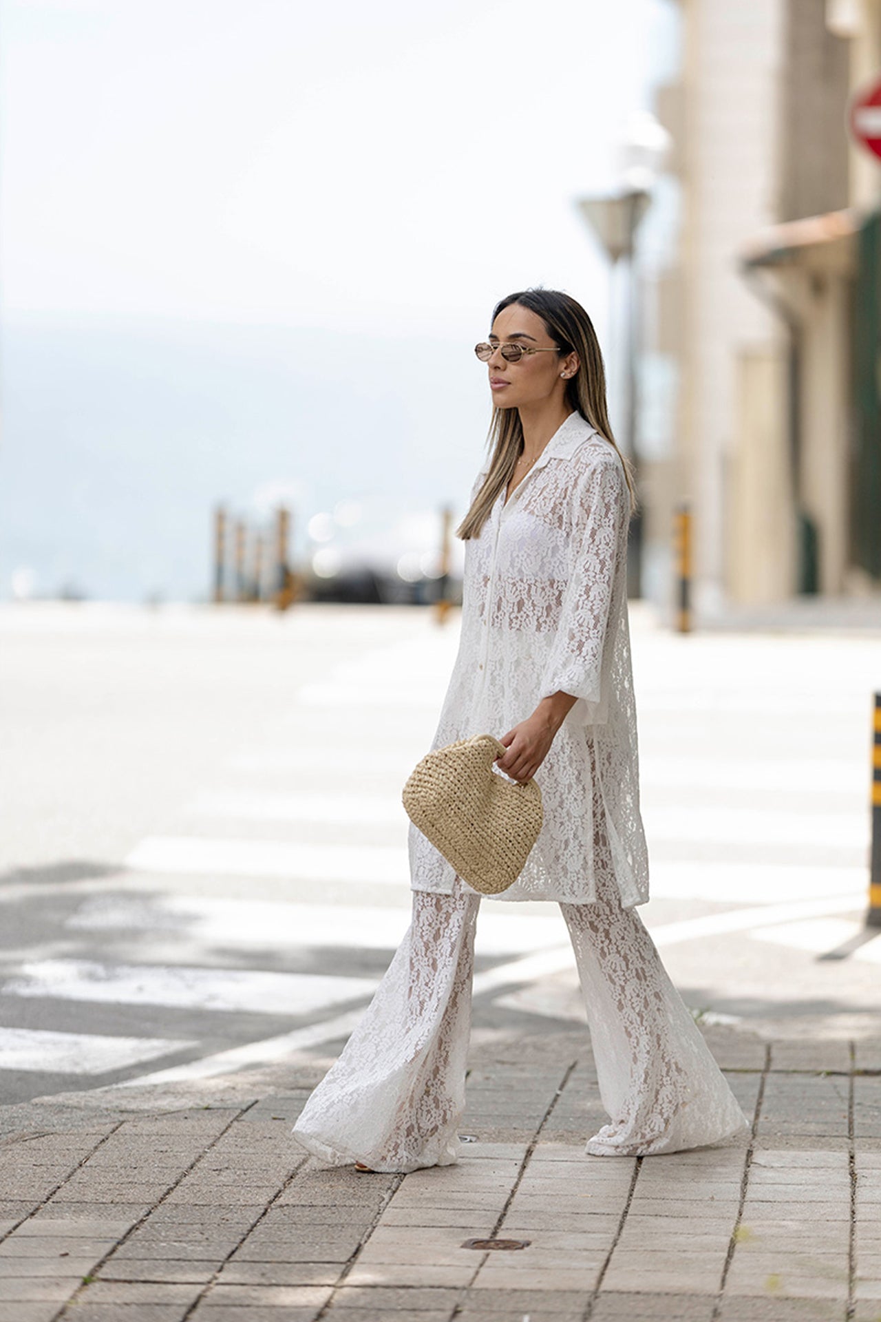 Calças flare em malha rendada