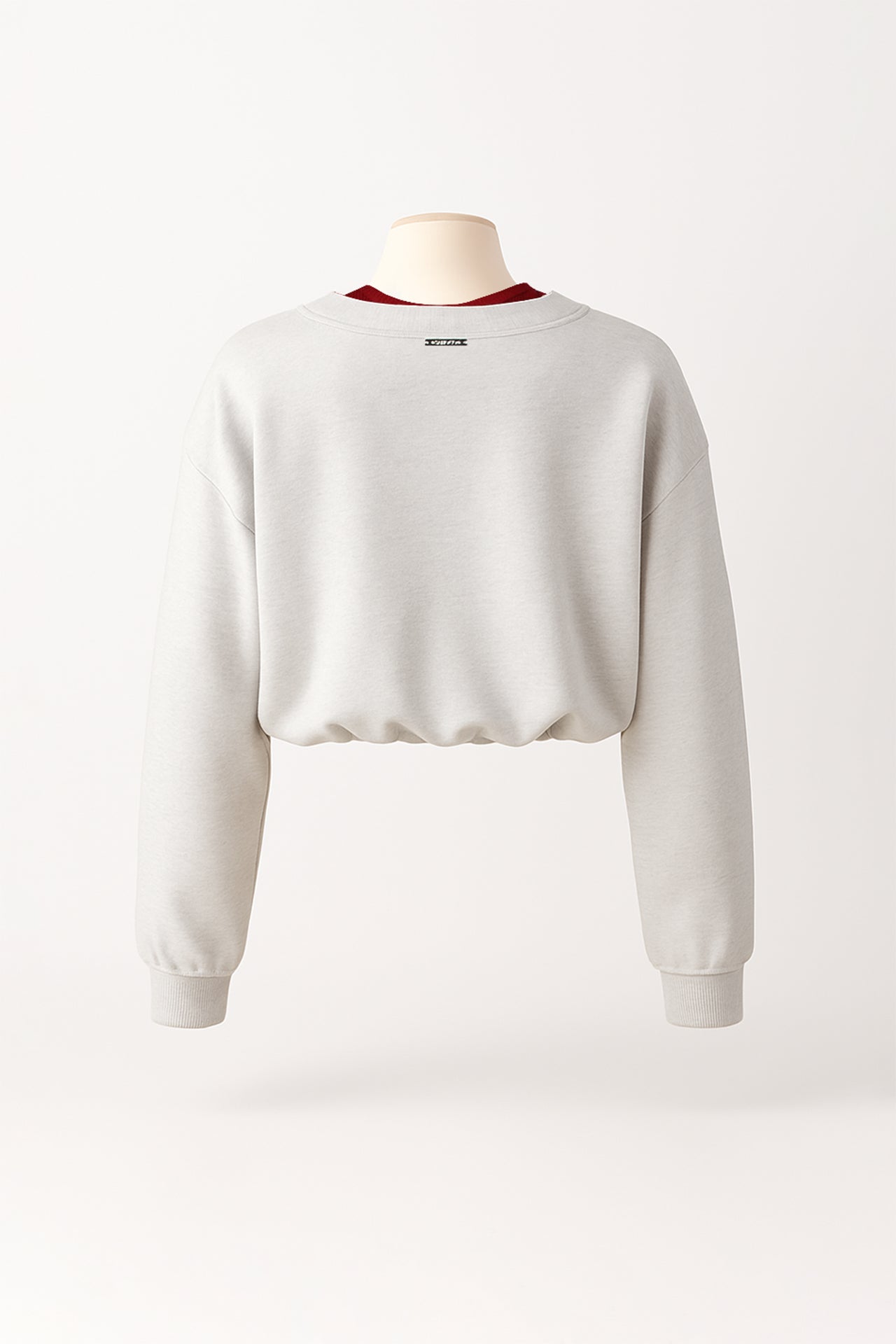Sweatshirt cropped em cinzento com decote em V