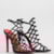 Heeled sandal with straps